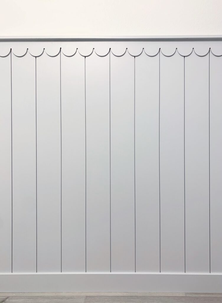 Sherwin Williams Olympus White scalloped trim shiplap accent wall