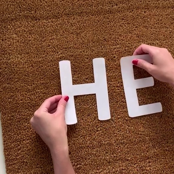 arranging letters for DIY doormat