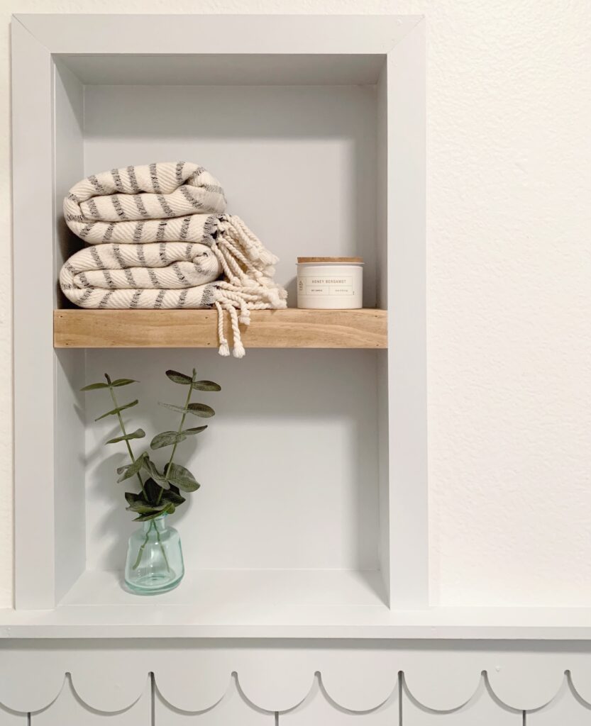 Bathroom open shelving with wood and Olympus White Sherwin Williams