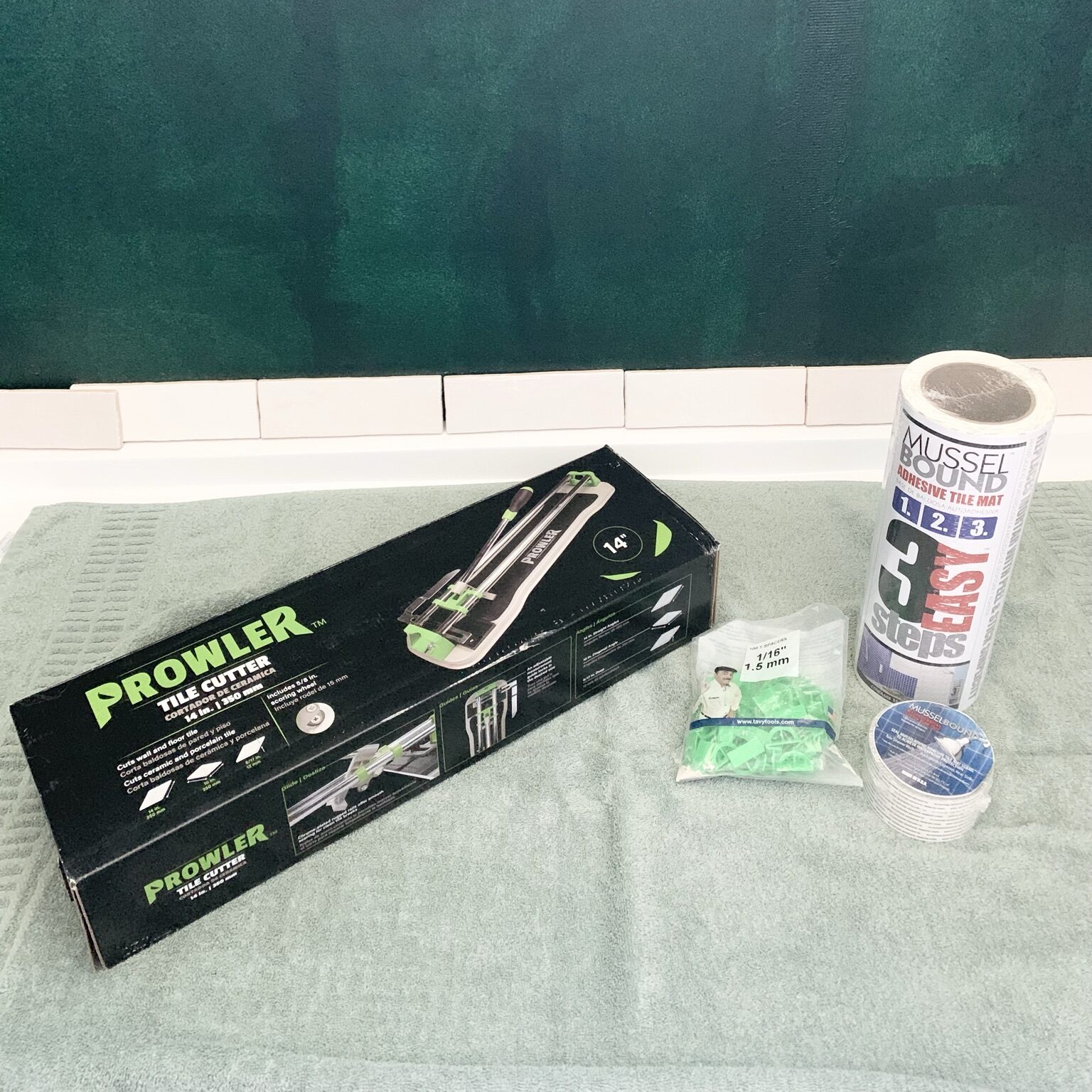 DIY shower remodel tools including Musselbound