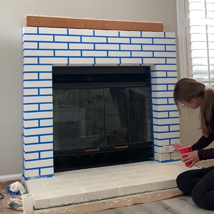 DIY faux brick fireplace using tape and mortar or joint compound