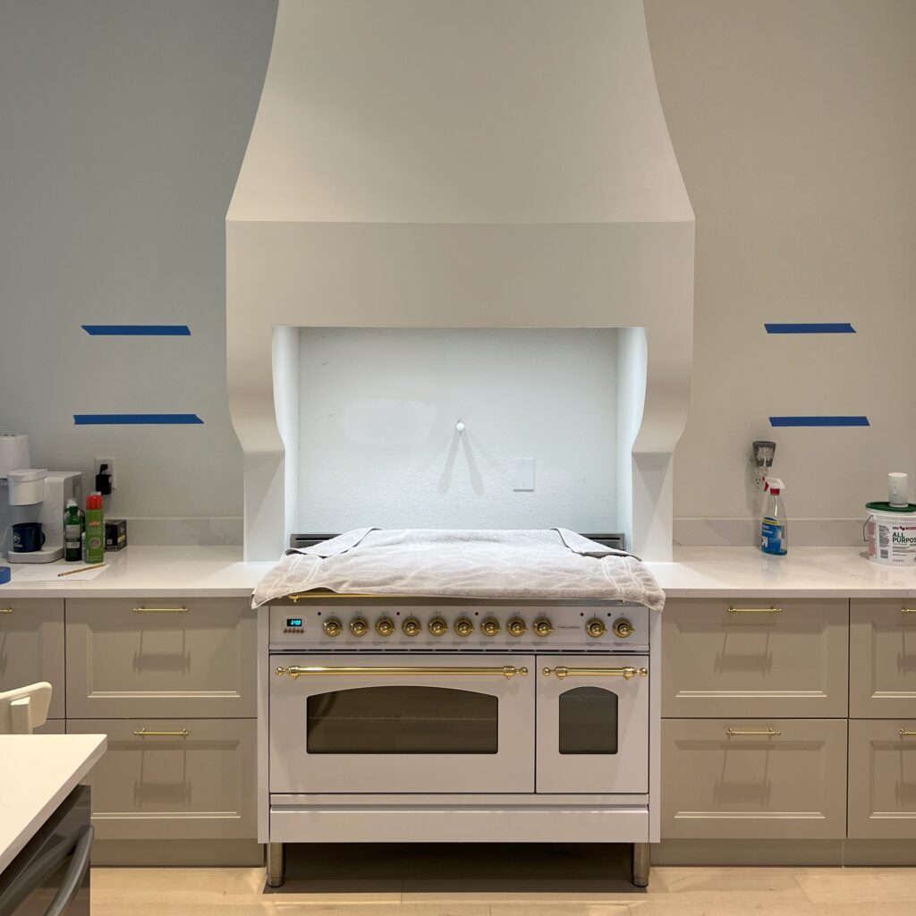 custom range hood with white brass Hallman 48 inch range