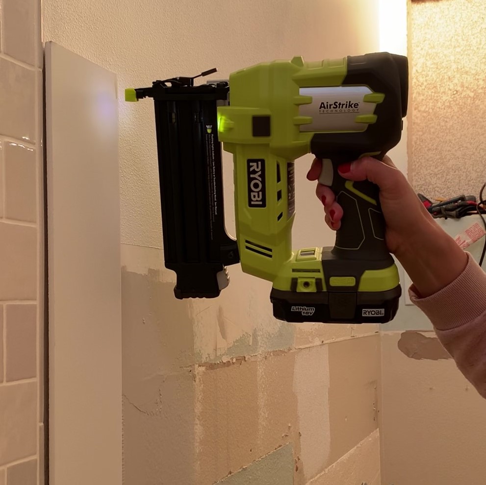 installing MDF shiplap with a Ryobi brad nailer