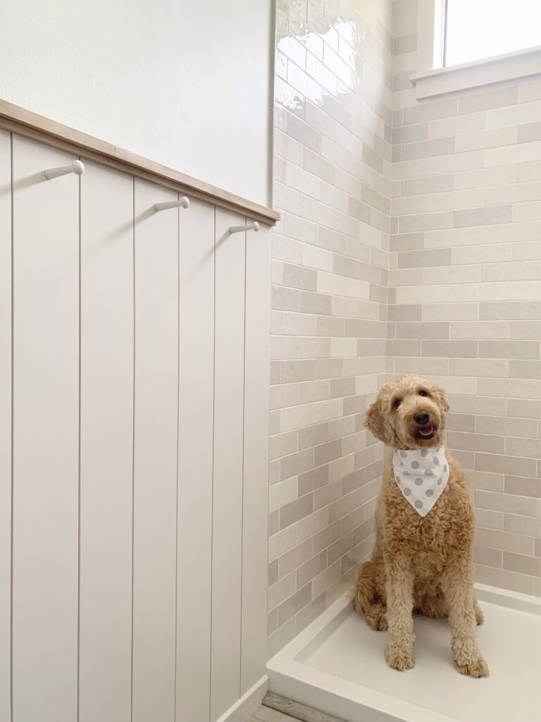 light gray DIY vertical shiplap with wood trim in bathroom