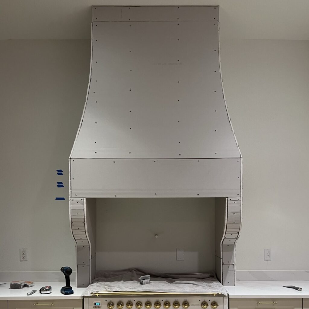 range hood with curves
