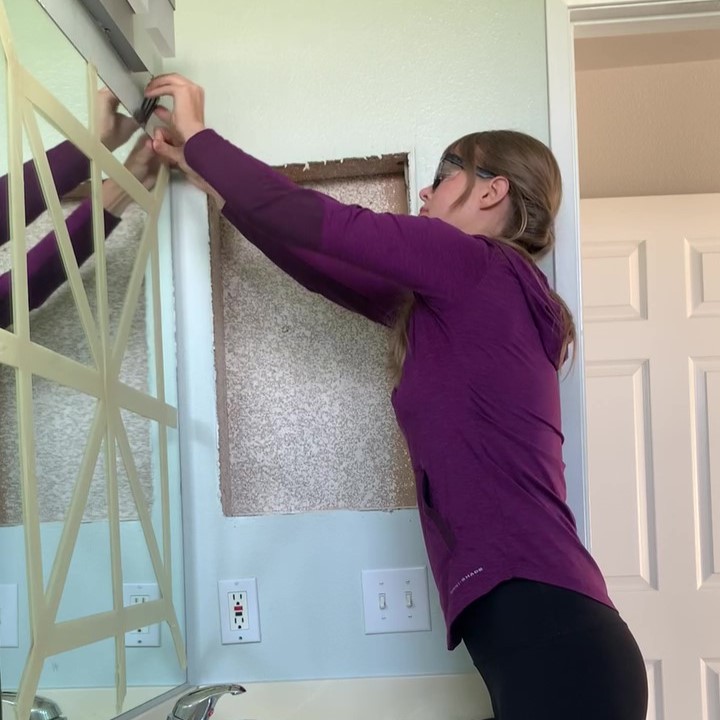 removing bathroom mirror