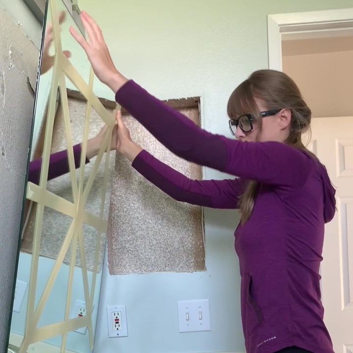 removing bathroom vanity mirror
