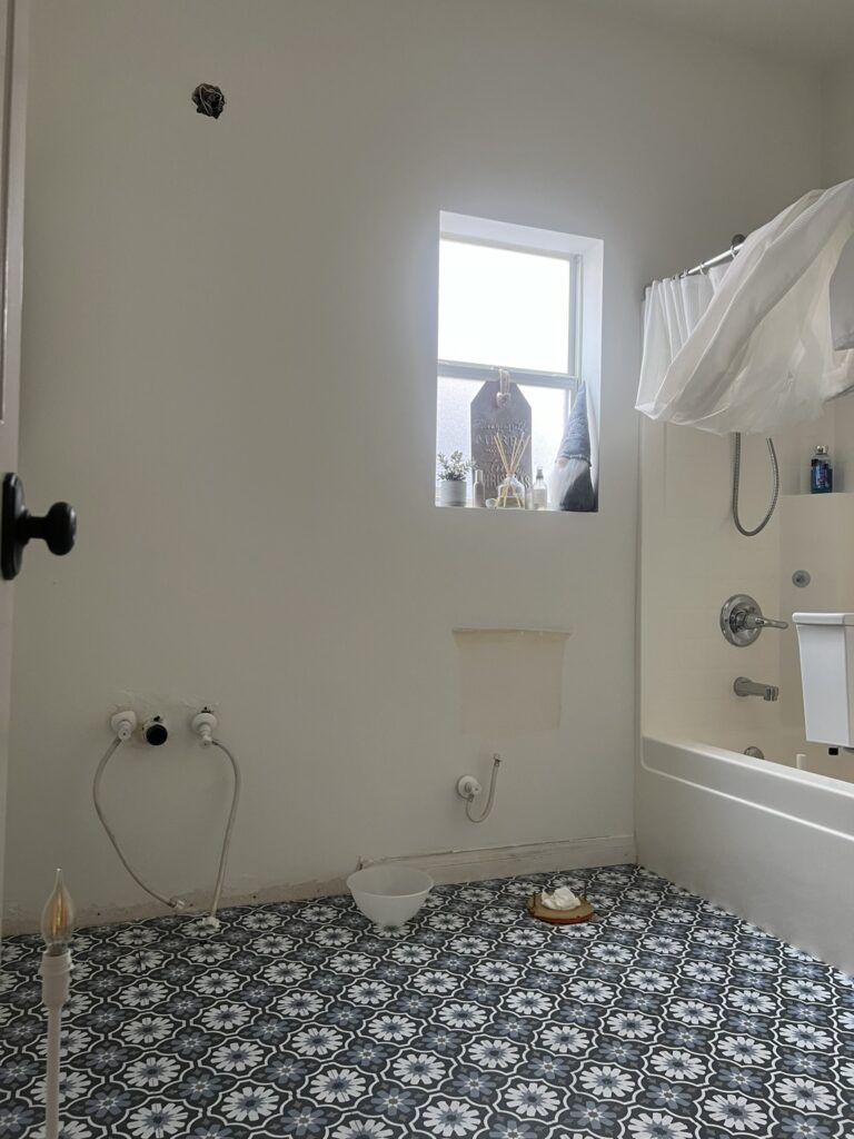 bathroom with temporary vinyl peel & stick tiles