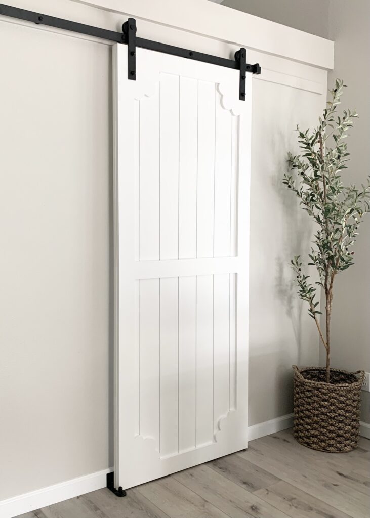 Agreeable Gray walls with white barn door