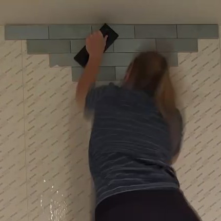 pressing on cermaic wall tile