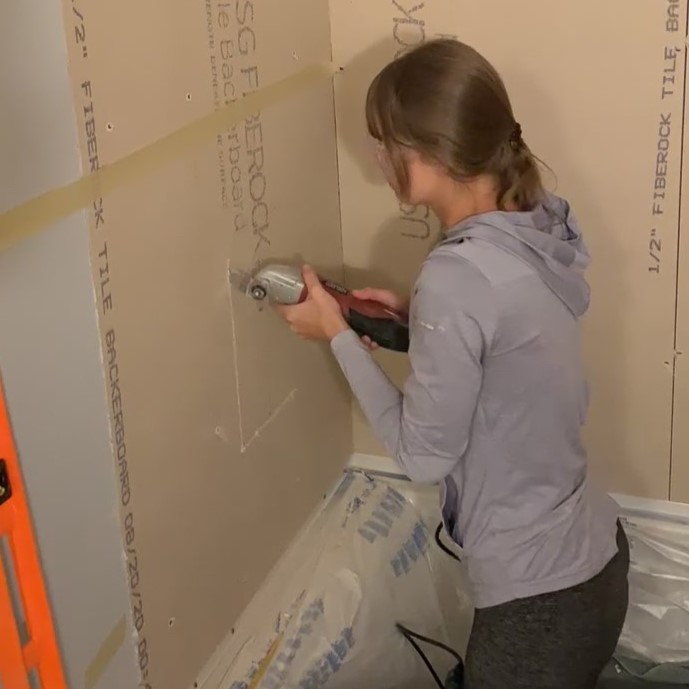 cutting a hole for a shower niche