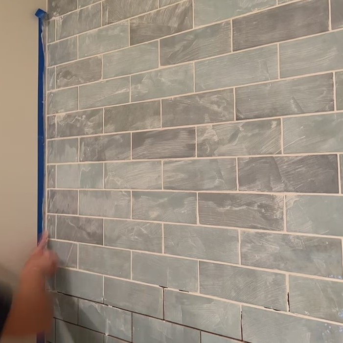 grouting tile wall