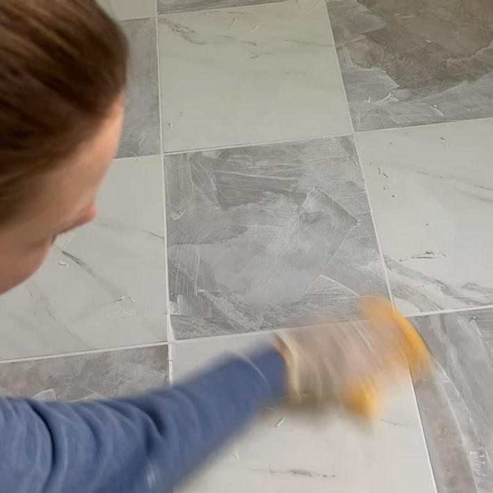 grouting gray and white checkerboard floor