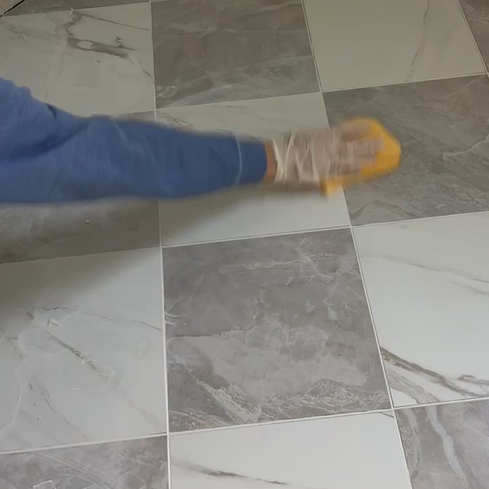 wiping gray and white checkered floor