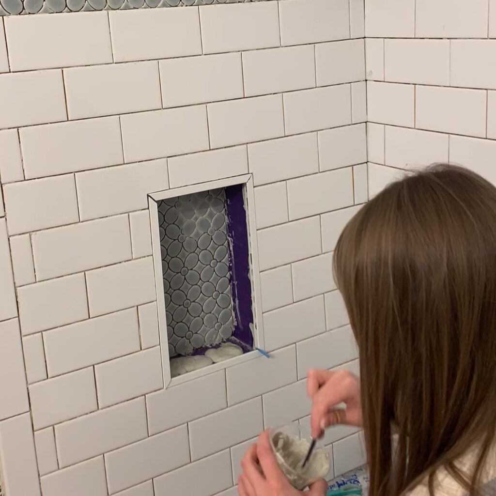 edge trim in custom shower niche