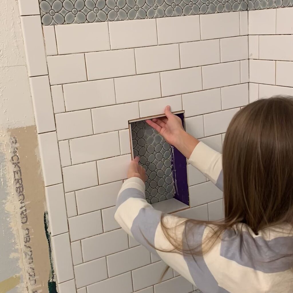 installing ceramic tile in shower niche
