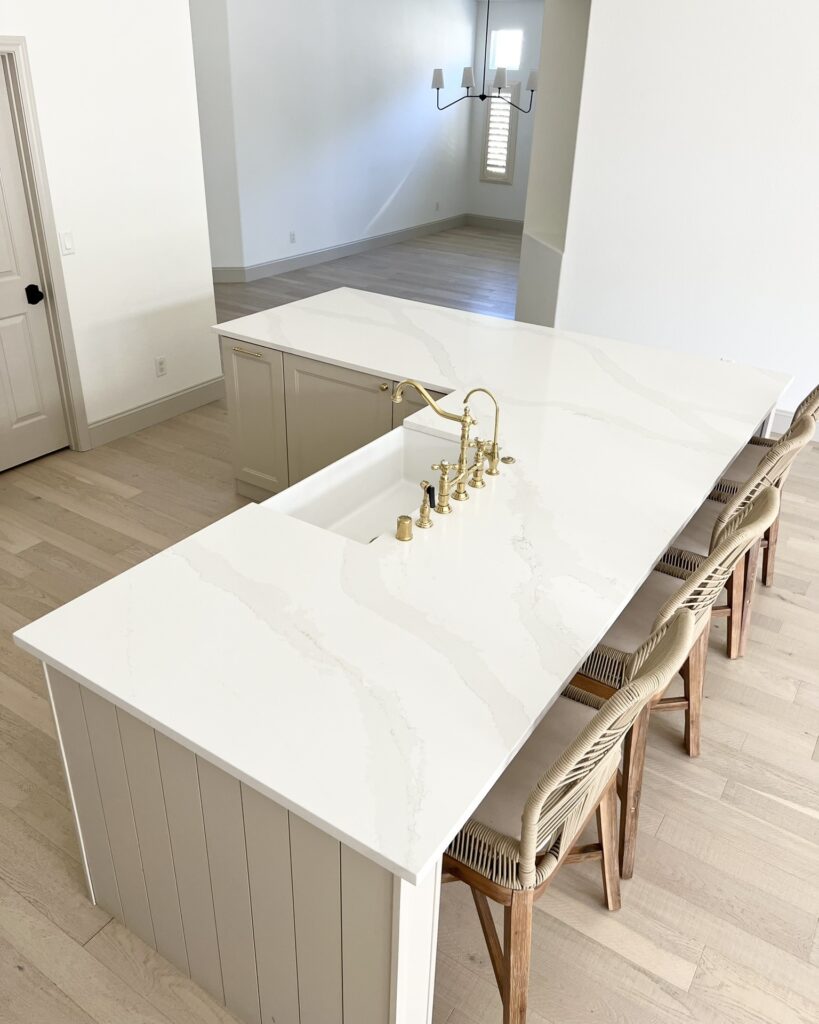 Silestone Calacatta Gold with brass finishes