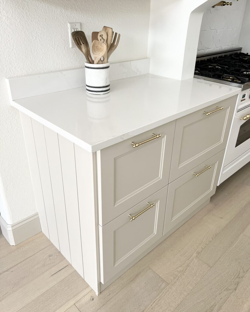 Silestone Calacatta Gold with accessible beige cabinets