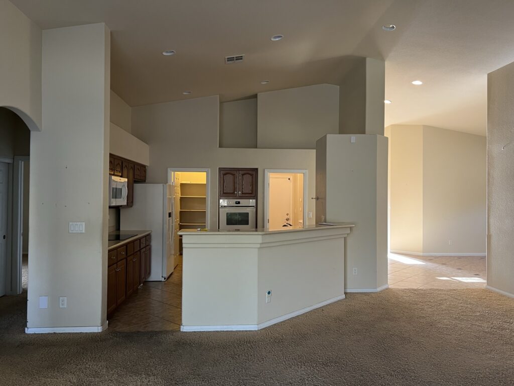 outdated kitchen with dark cabinets