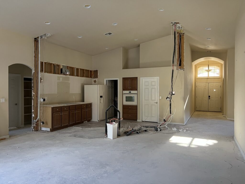 kitchen remodel progress with electrical and plumbing exposed