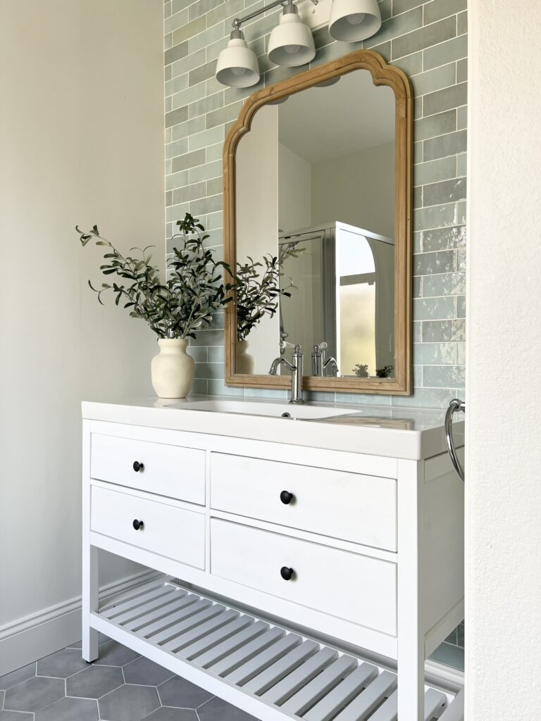 Bathroom with white IKEA HEMNES vanity, wood mirror and Bedrosians Cloe Baby Blue tile