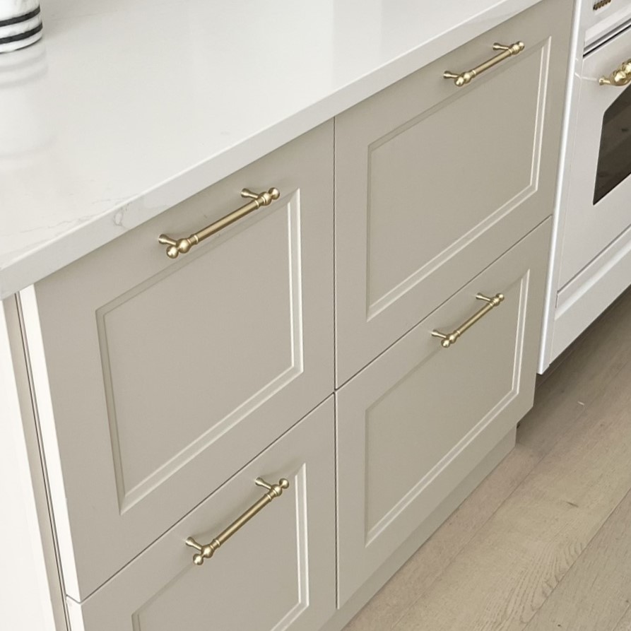 accessible beige kitchen cabinets with brass cabinet pulls