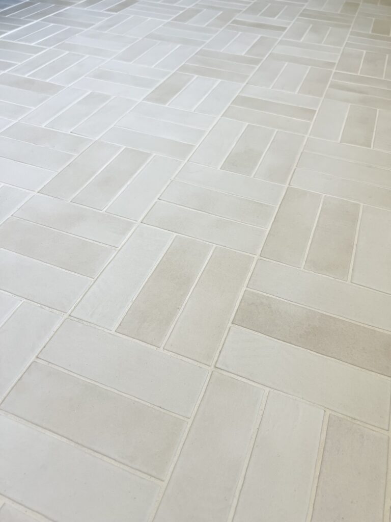 Bedrosians Celine matte white tile in a crosshatch tile pattern