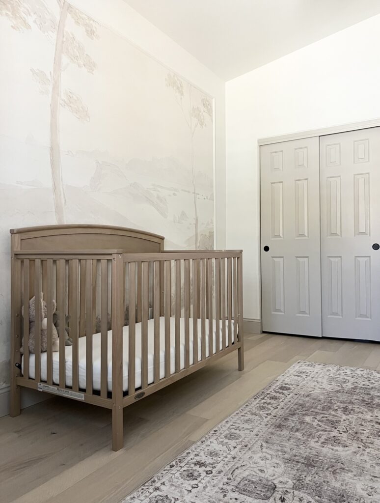 Sherwin Williams Alabaster nursery with Accessible Beige trim