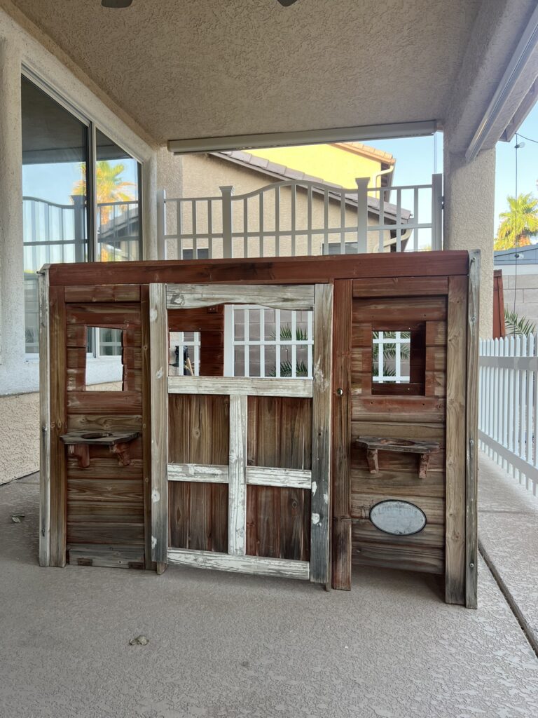 taking apart wooden playhouse for a makeover