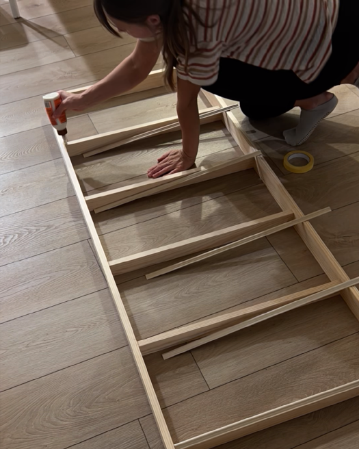 adding trim to bookshelves