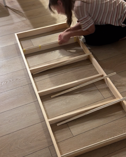 adding trim to bookshelves