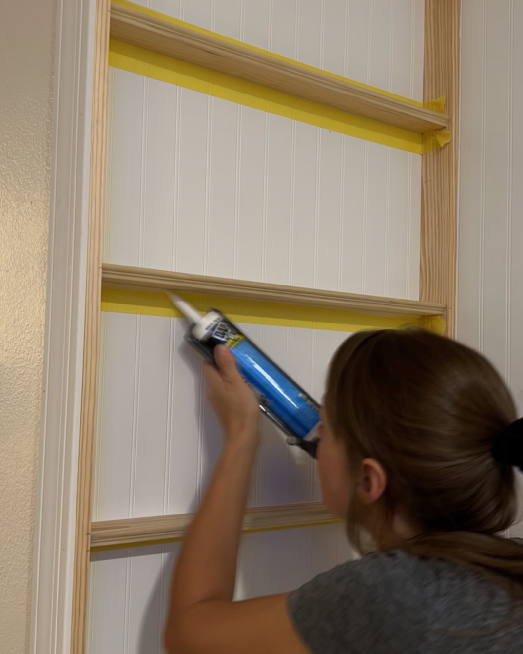caulking bookshelves