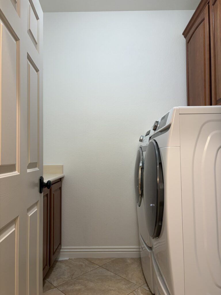 laundry room with bulky washer and dryer