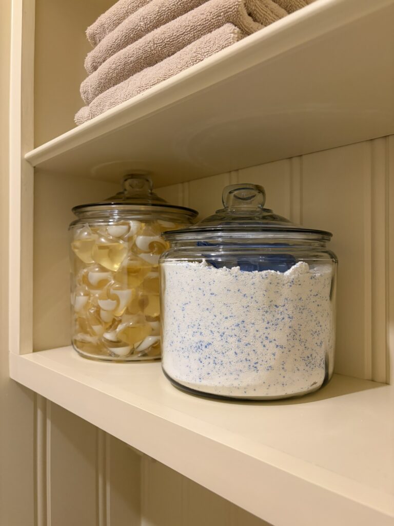 laundry detergent in glass canisters
